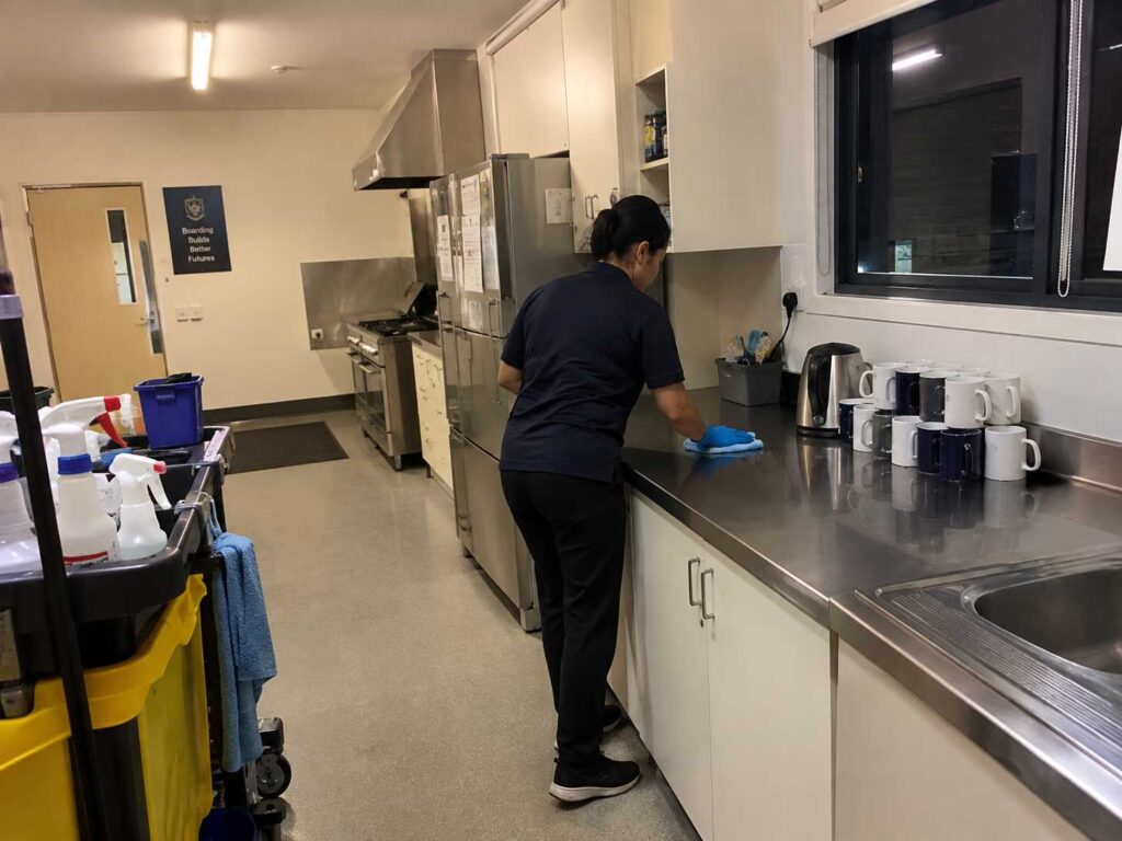 Dormitory kitchen being cleaned at a Sydney boarding school