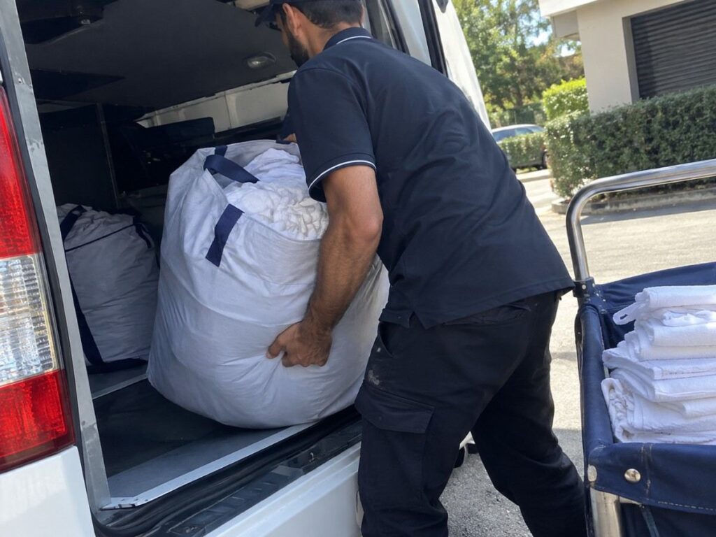 Bulk linen collection for a commercial laundry service in Sydney