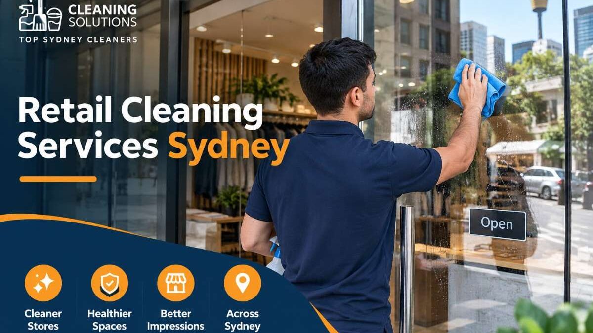 Cleaner wiping storefront glass during retail cleaning in a Sydney shop