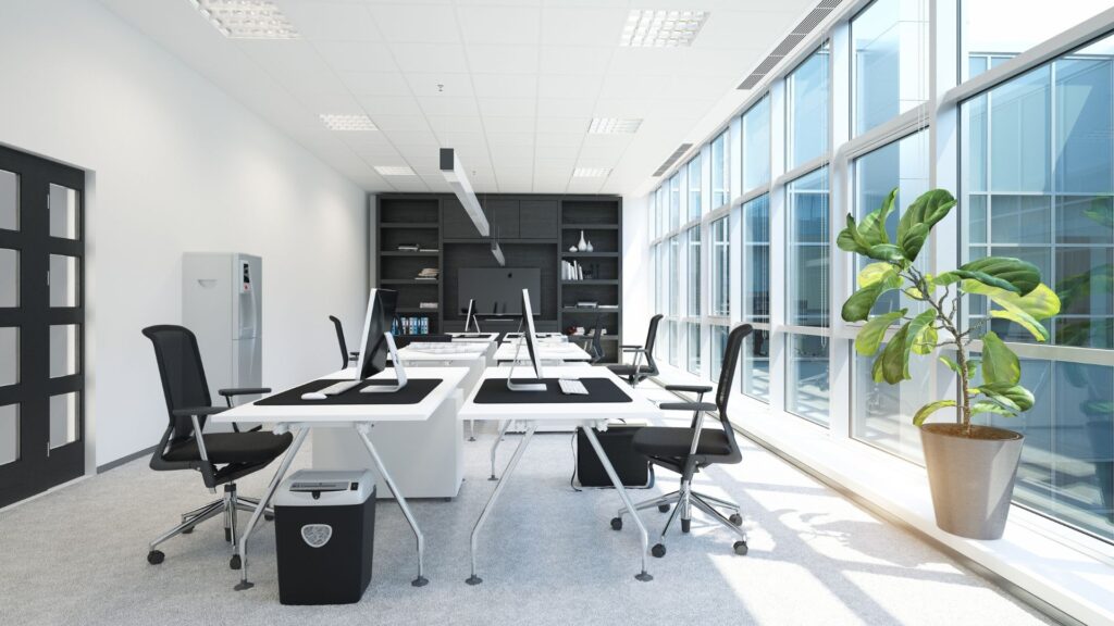 A bright, well-presented shared office space with floor-to-ceiling windows