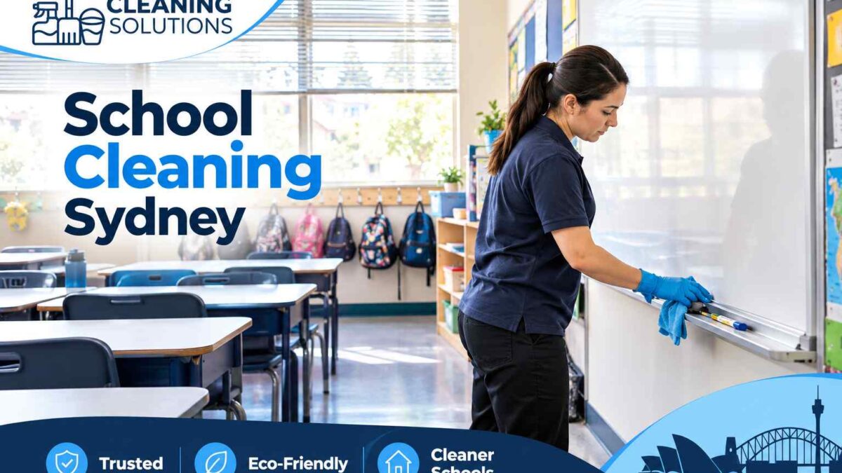 Cleaner wiping down a classroom whiteboard tray in a Sydney primary school after hours