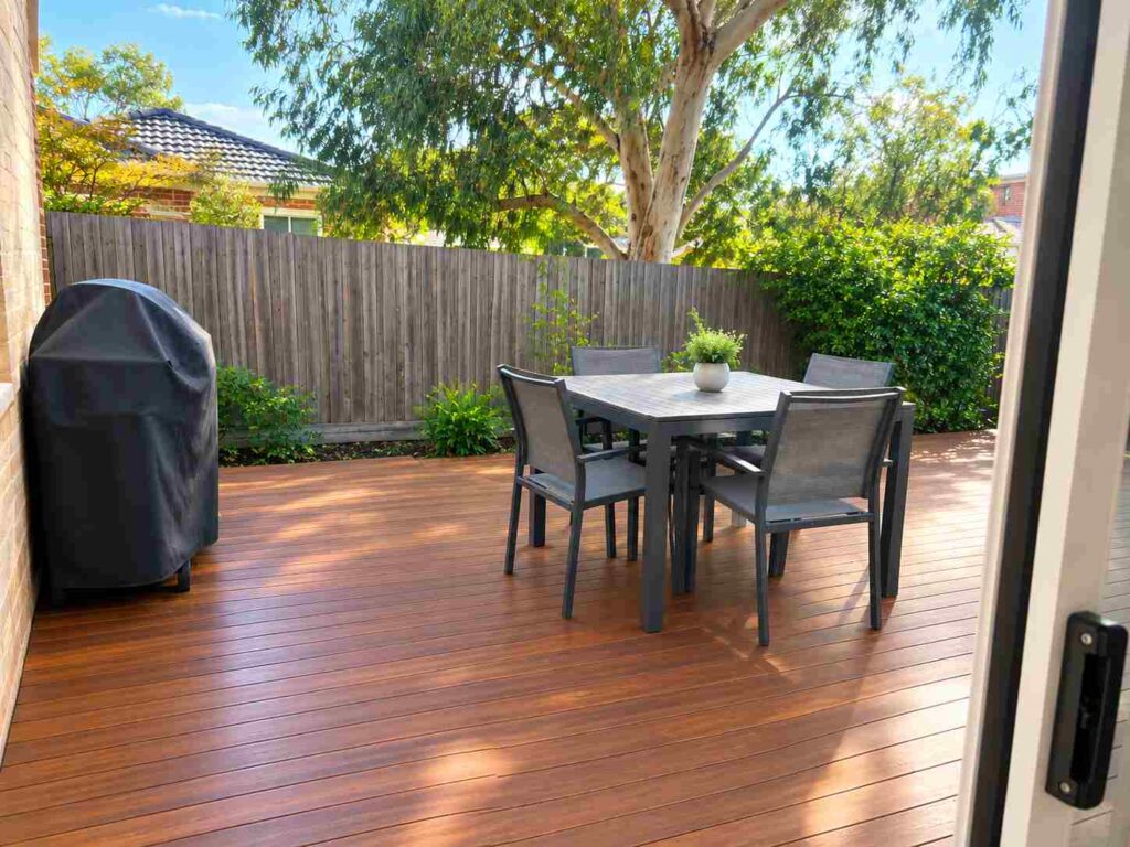 Swept timber deck and outdoor table at a Sydney house after airbnb house cleaning